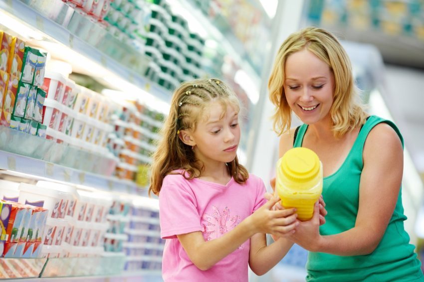 mother daughter checking product label